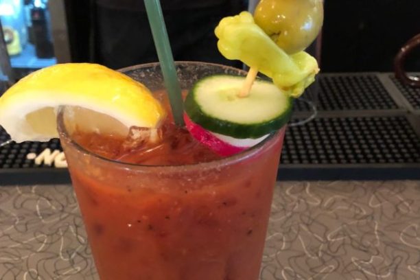 a cup of coffee and a glass of orange juice