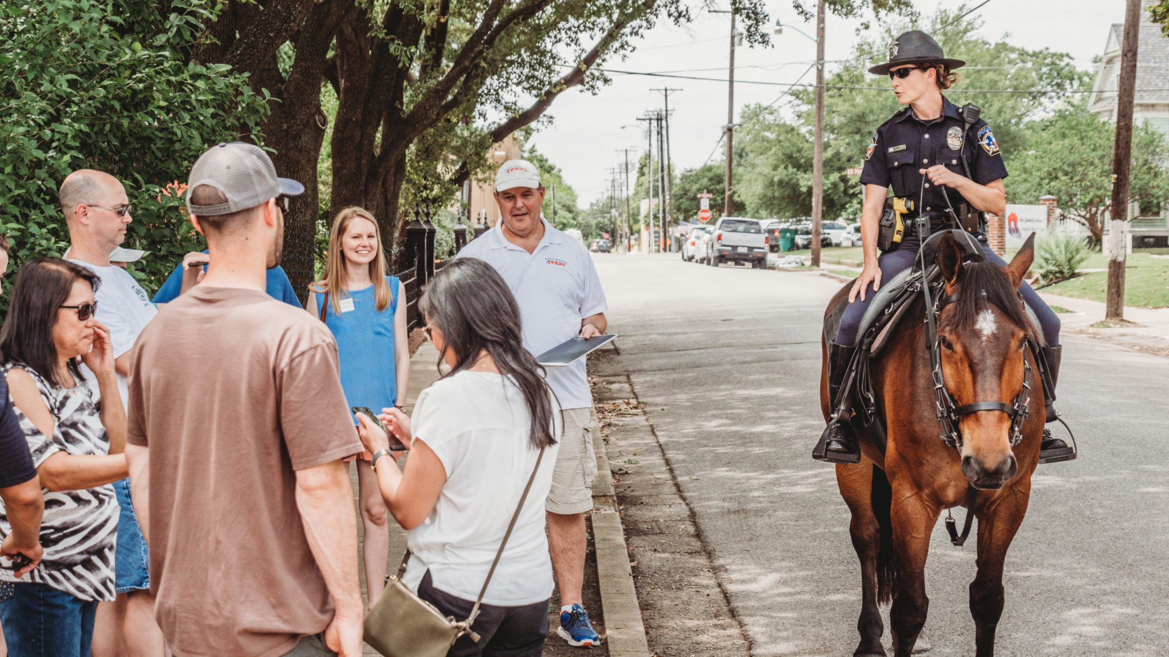a group of people riding on the back of a horse