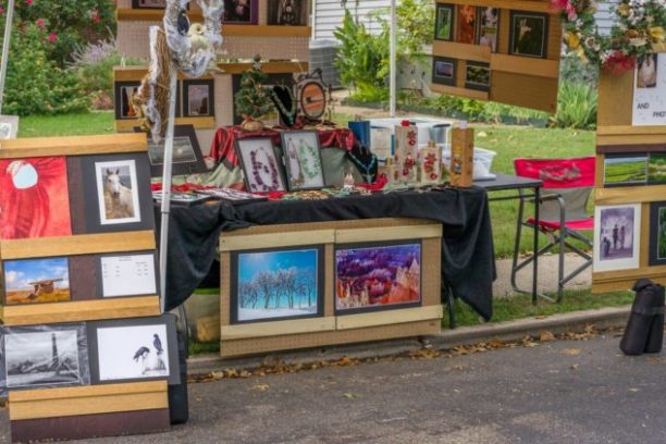 a stack of flyers on a city street